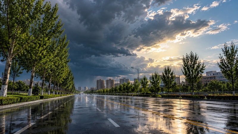 Wet roads and receding storm clouds after a North China summer thunderstorm
